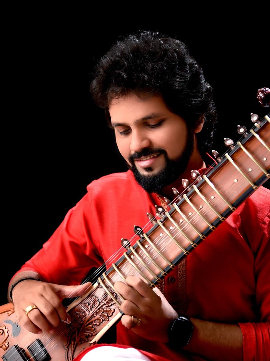 Prasad Rahane playing sitar