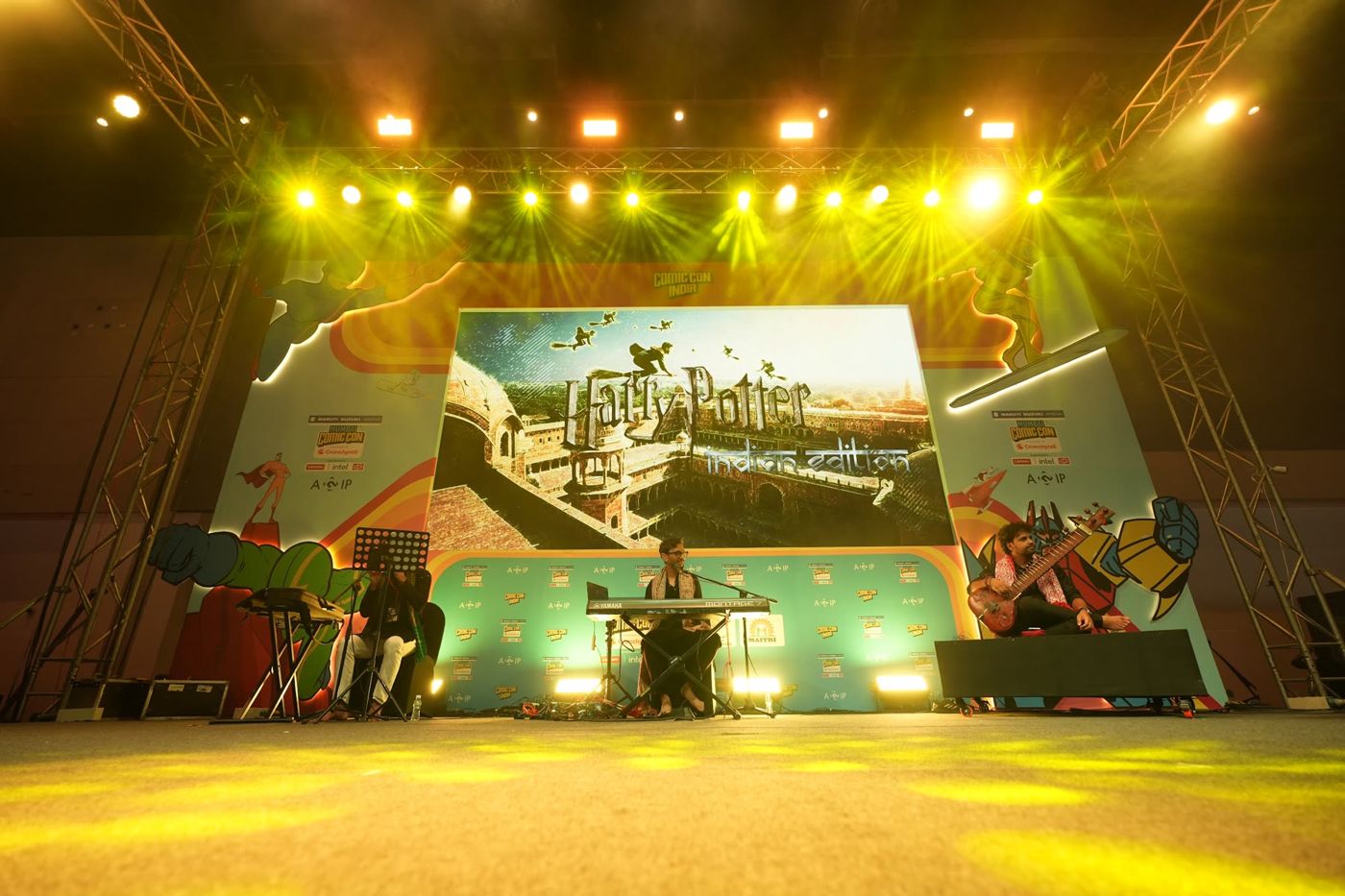 A wide stage under warm lights